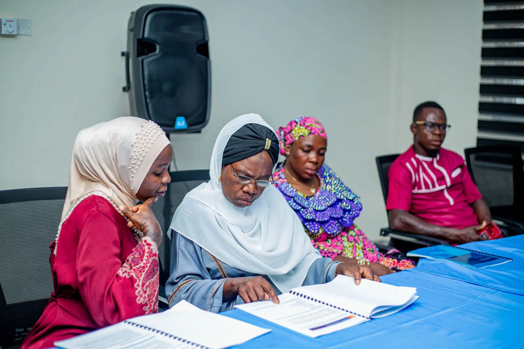 Facilitators reviewing Digital Walansi programme findings together